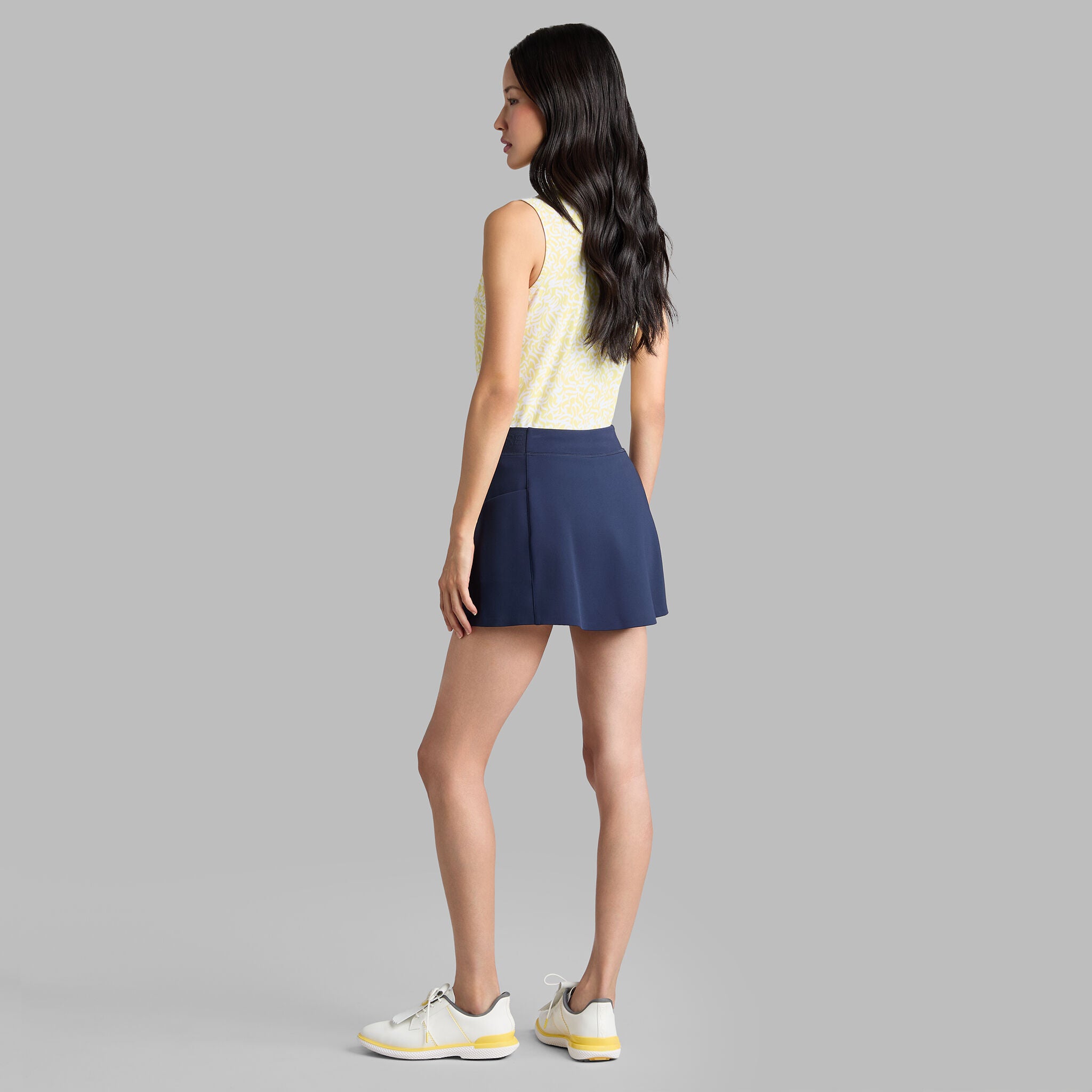 SCRIBBLE TECH PIQUÉ SLEEVELESS POLO