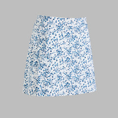 SCATTERED DITZY FLORAL SILKY TECH NLYON SKORT