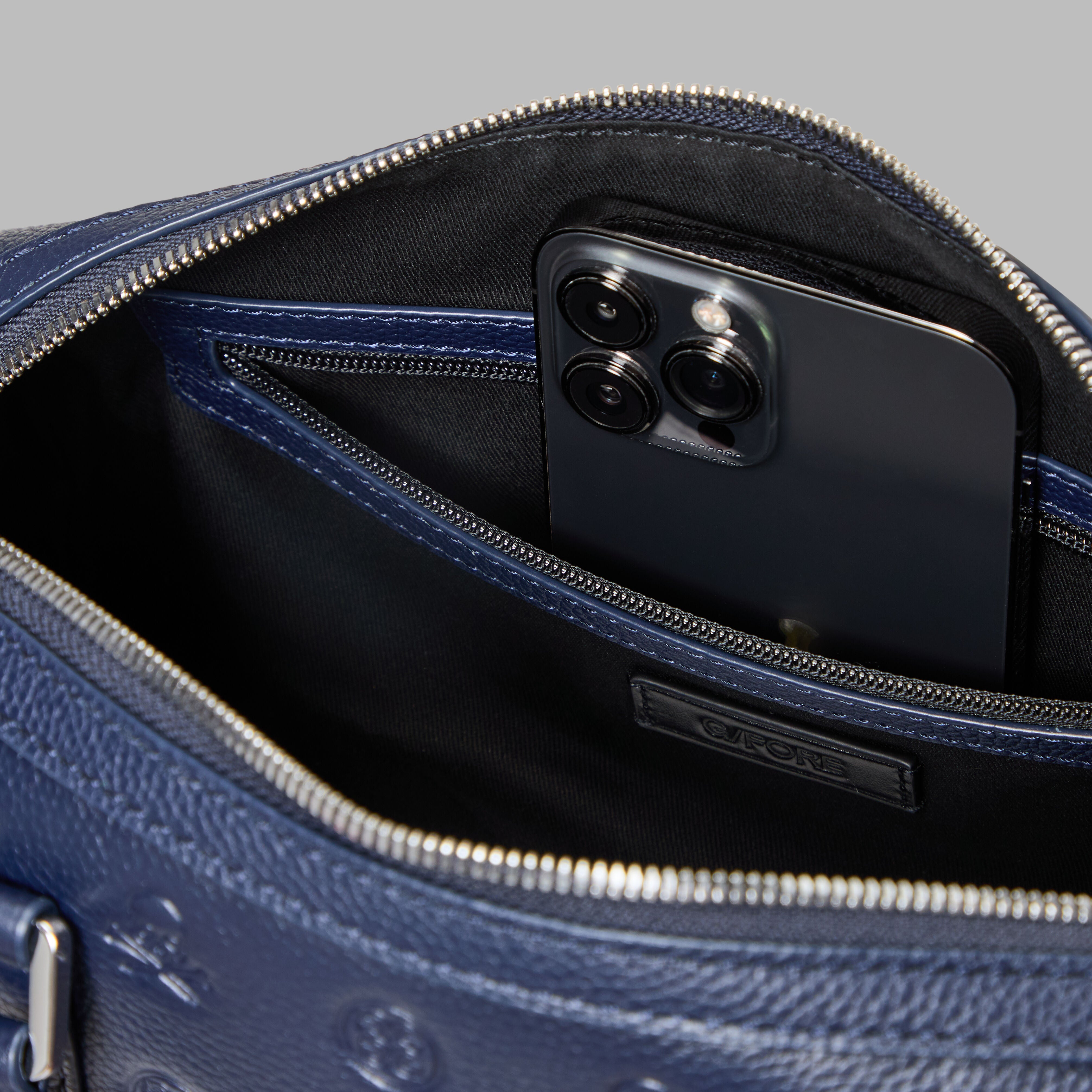 EMBOSSED SKULL & TEES LEATHER MINI DUFFEL CART BAG