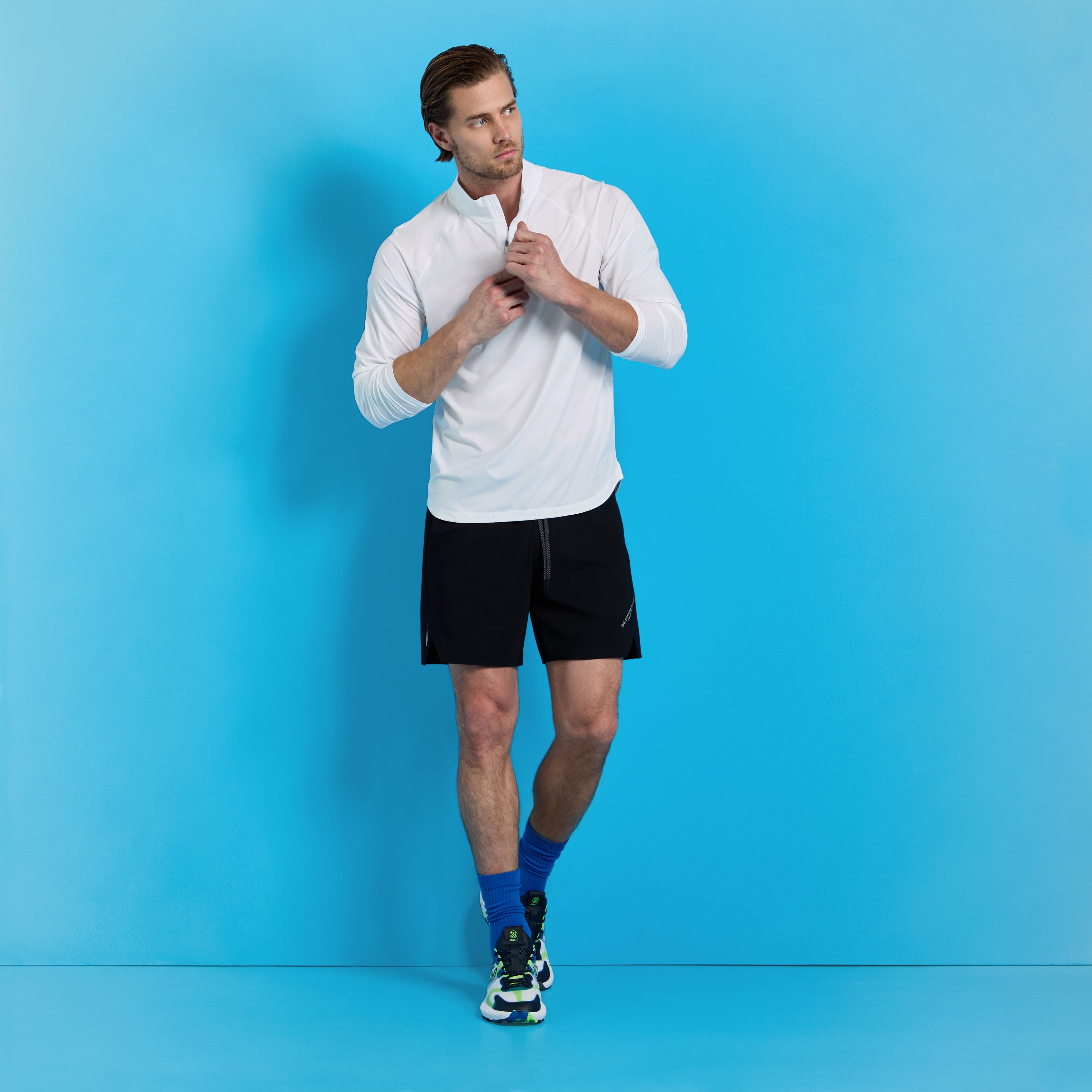 TECH MÉLANGE RAGLAN QUARTER ZIP PULLOVER