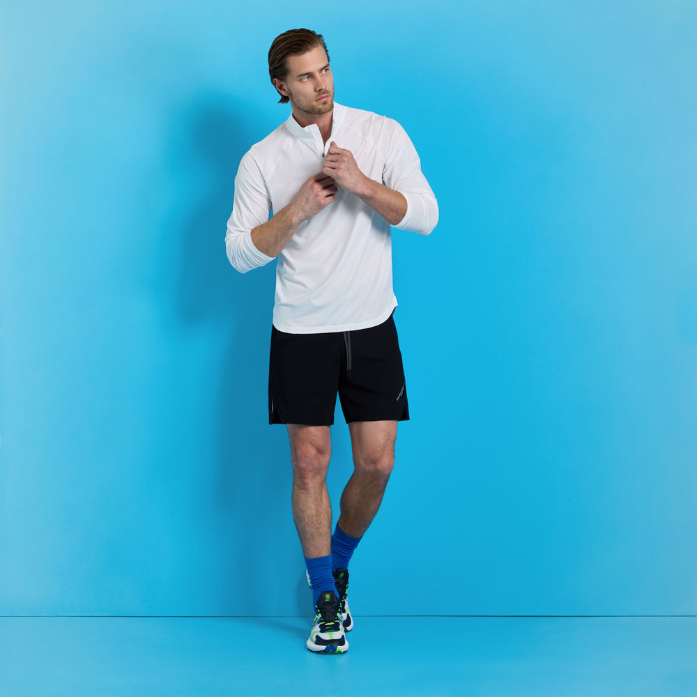 TECH MÉLANGE RAGLAN QUARTER ZIP PULLOVER
