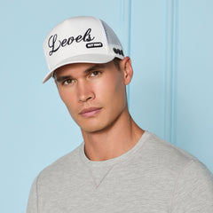 DAILY LEVELS TALL TRUCKER HAT