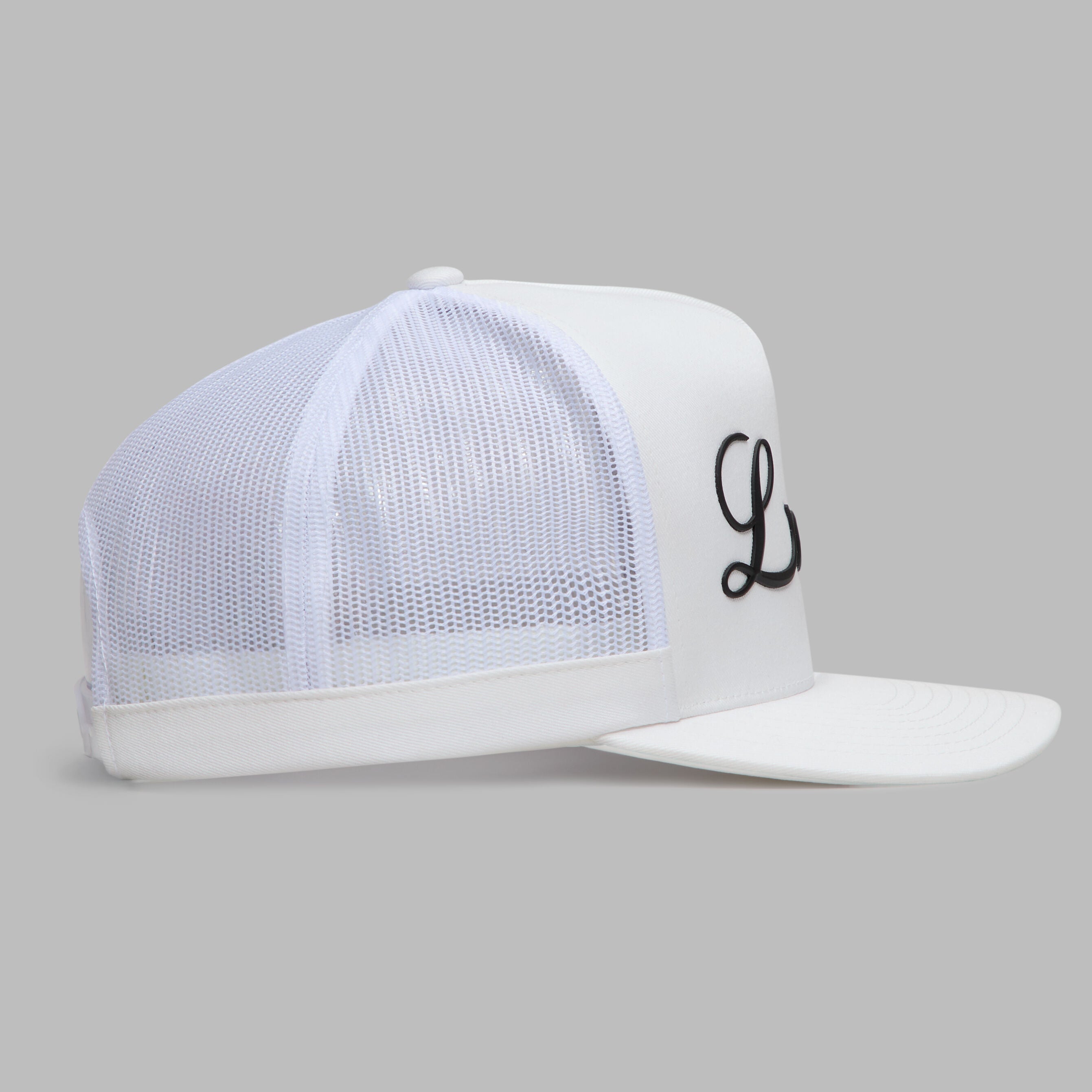 DAILY LEVELS TALL TRUCKER HAT