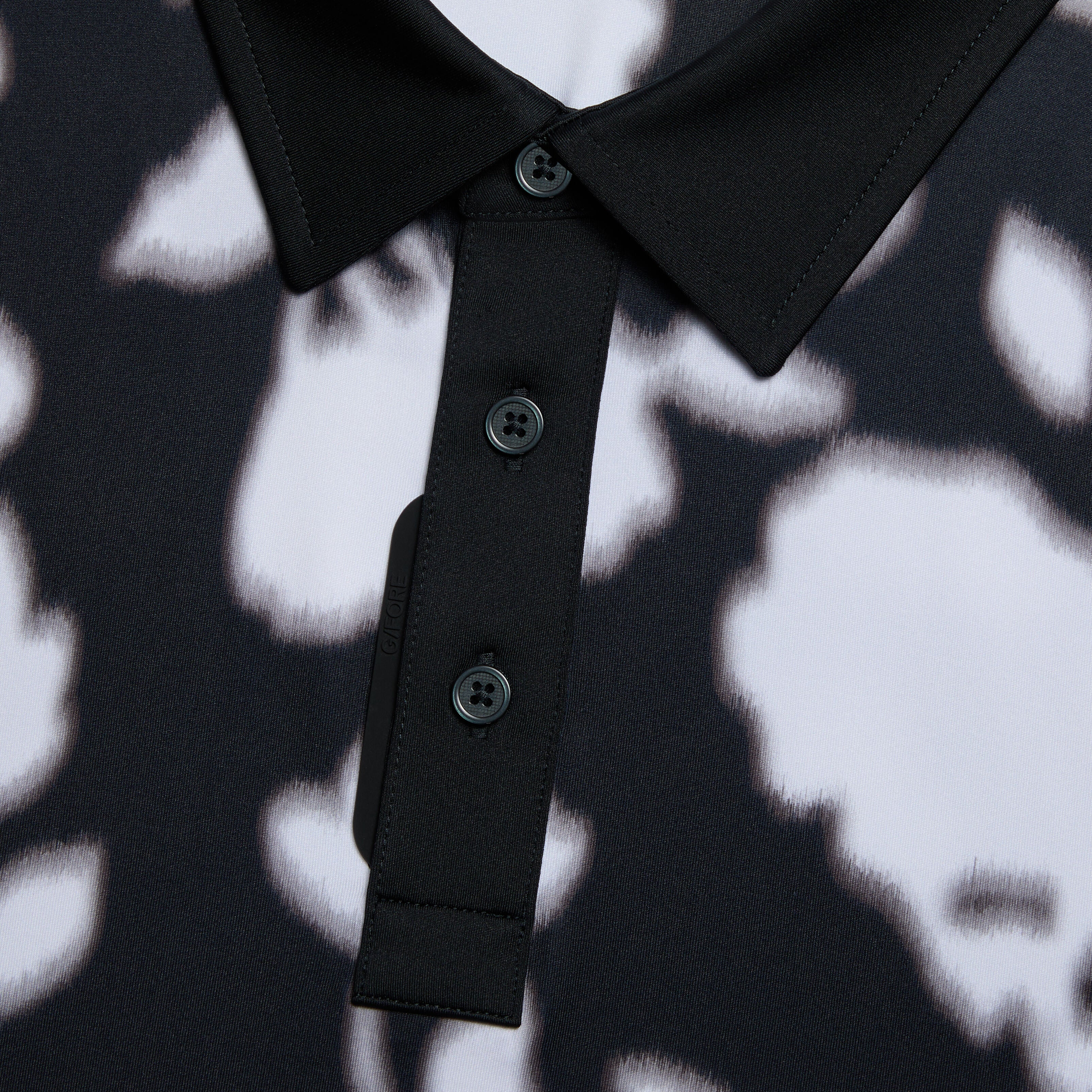 BLUR FLORAL TECH JERSEY POLO