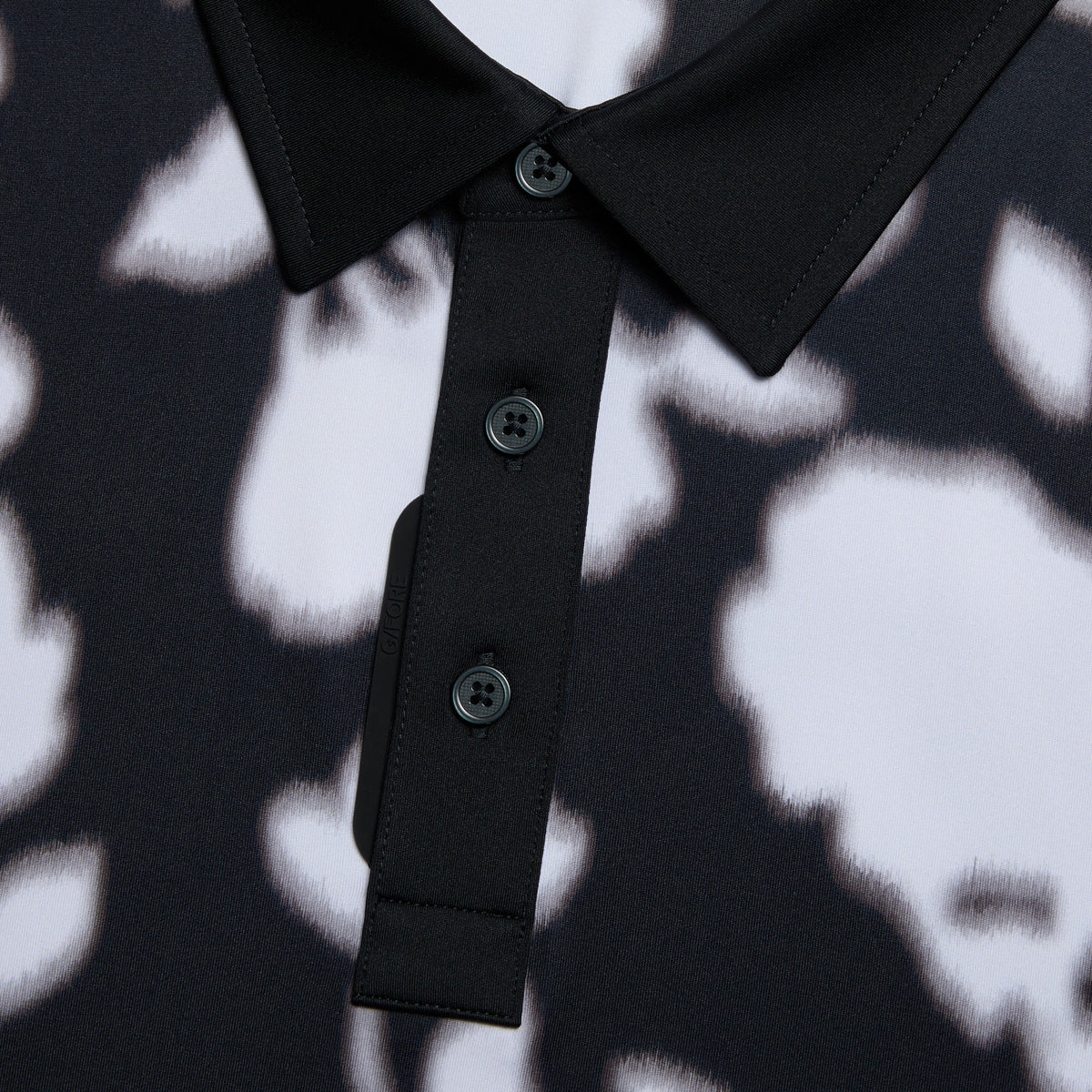 BLUR FLORAL TECH JERSEY POLO